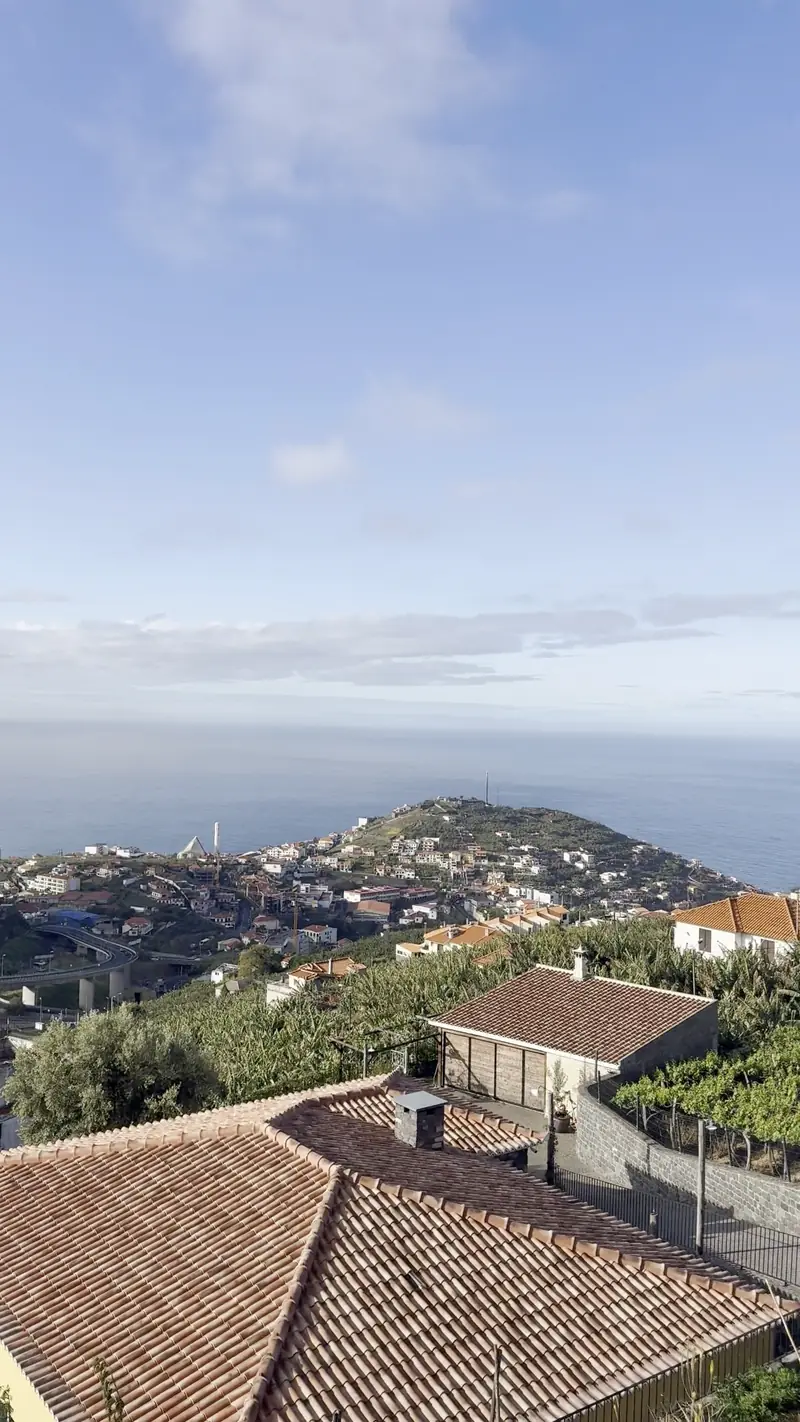 Terracotta roofs and the ocean on Madeira’s south coast